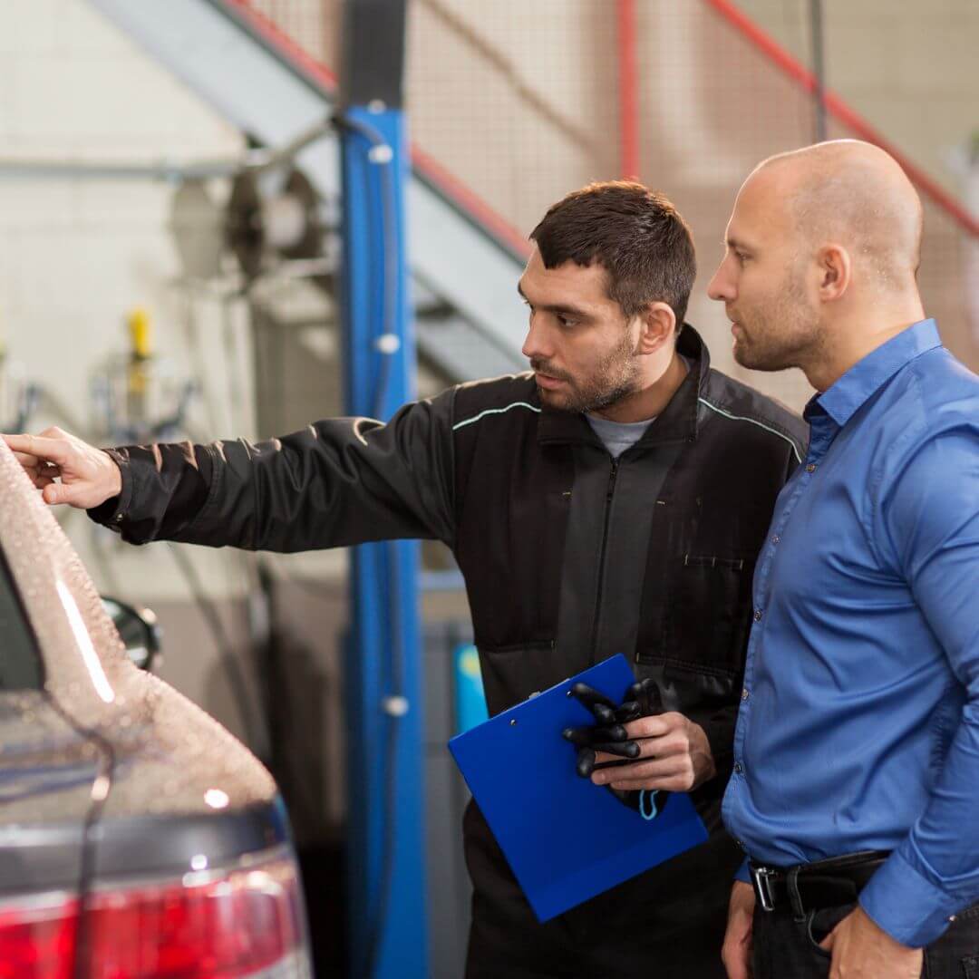 Mechanic Talks to Customer